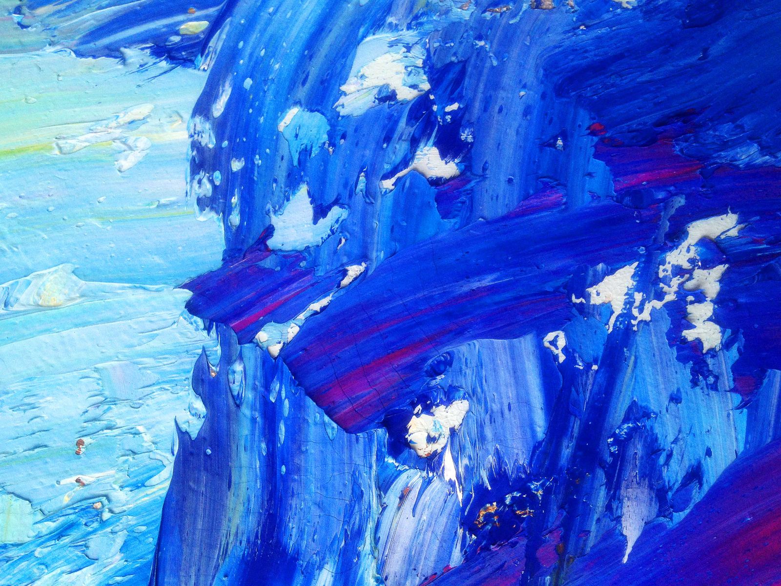 Painting in thick strokes of ultramarine, cobalt and white like a breaking wave