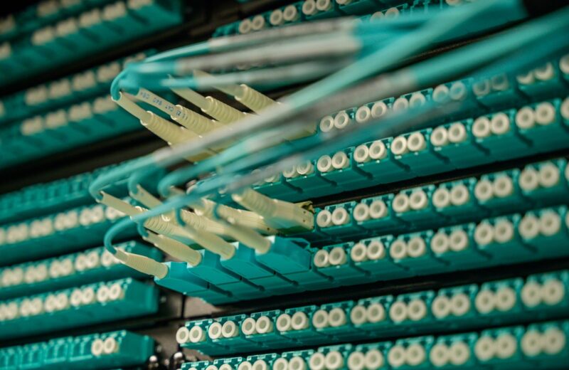 Fibre optic patch cables connected to a server rack