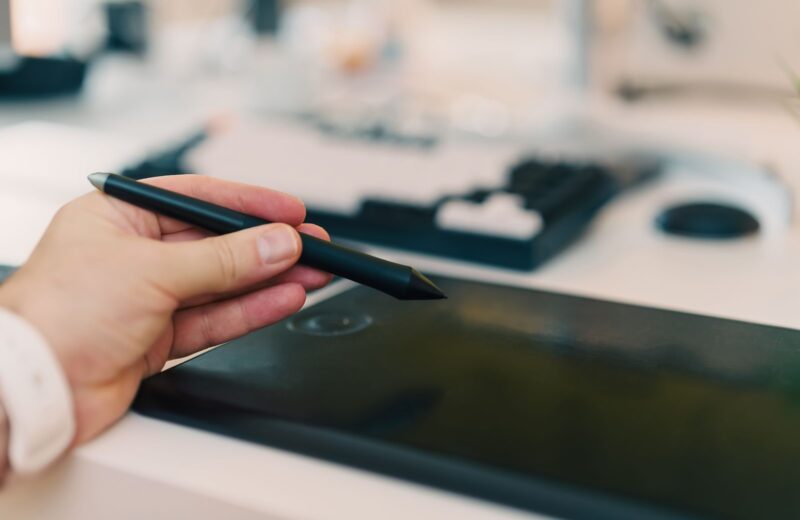 A hand drawing with a stylus on a graphics tablet