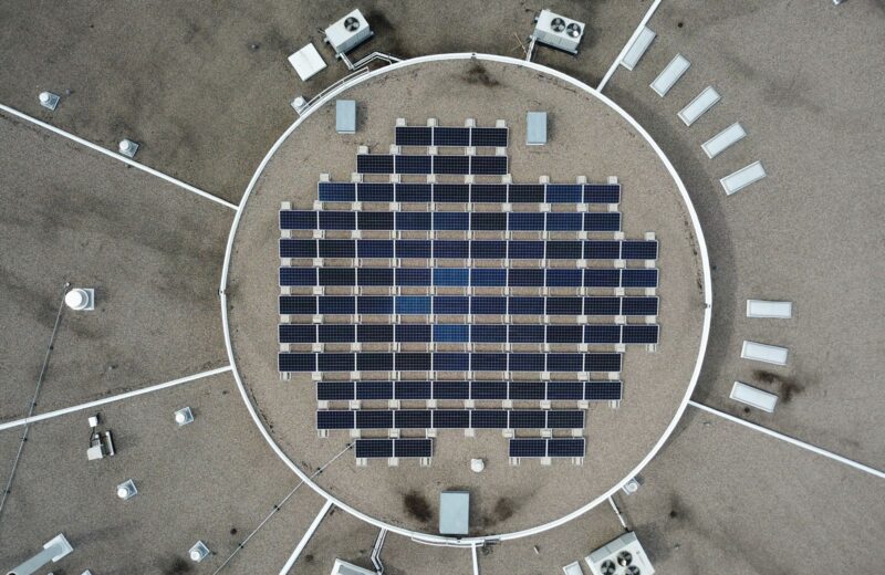 Solar panel array on a round rooftop, seen from above