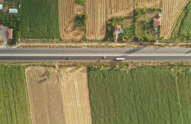 A rural road between fields, seen from above