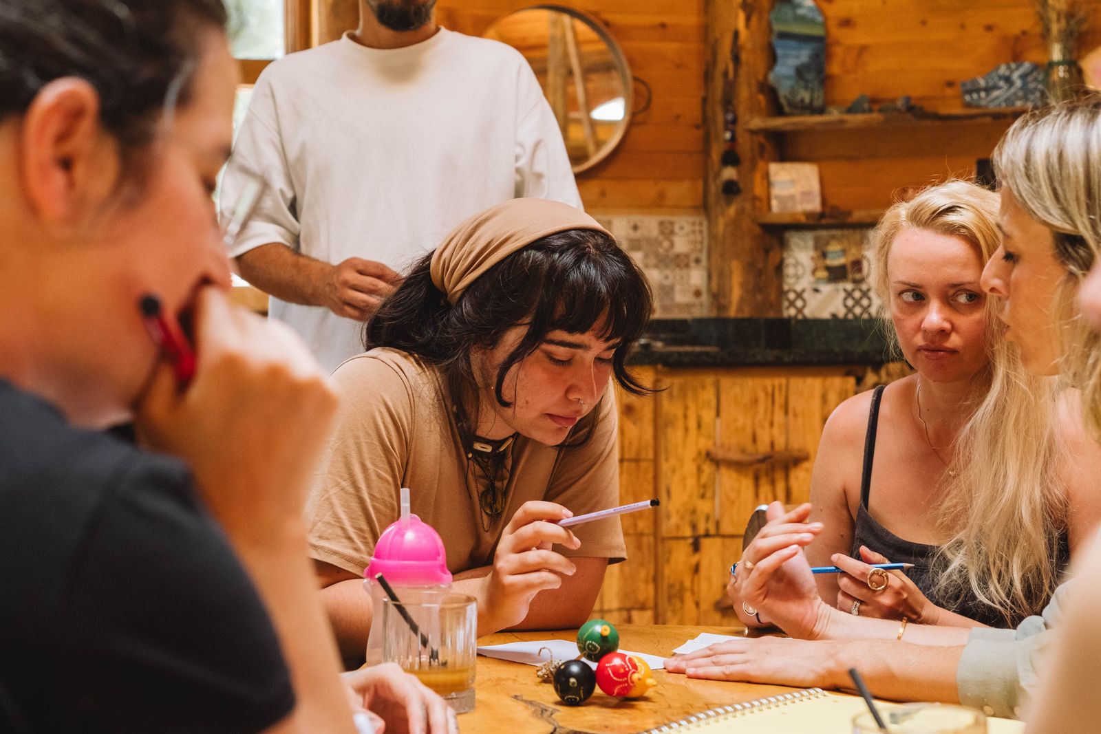 A group of trustees talking around a table at a planning meeting