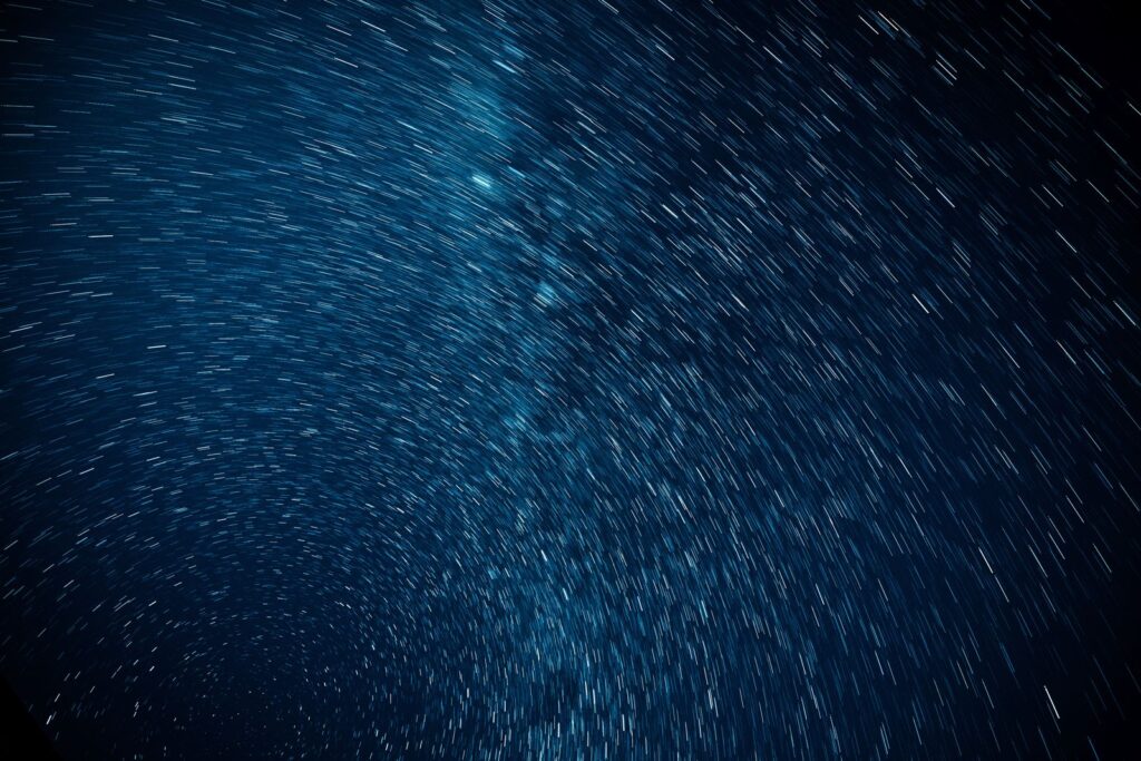 Star trails circling the sky in a long exposure photograph