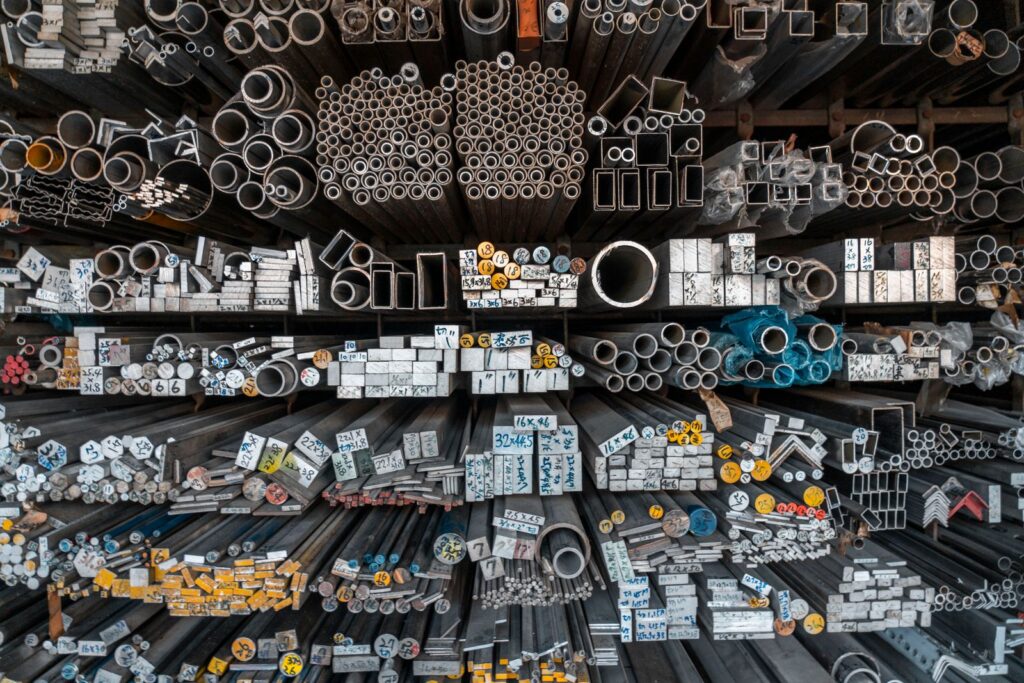 Racks of metal bars, tubes and profiles in a stockholder's warehouse