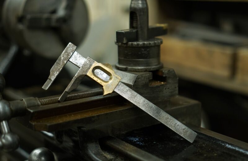 Vernier caliper resting on a machine in the workshop