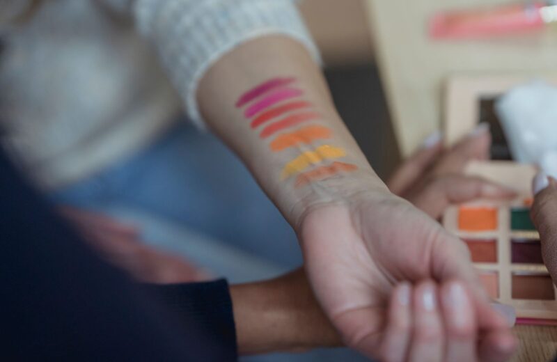 Shade swatches painted on the inside of an arm