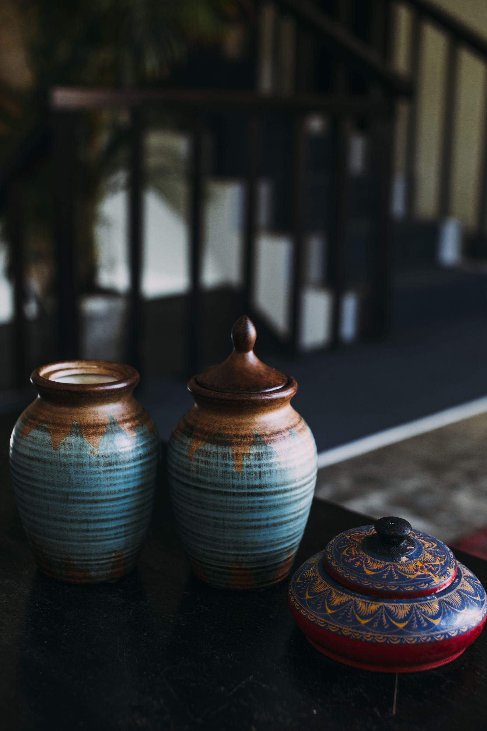 Two glazed stoneware jars with blue and brown bands