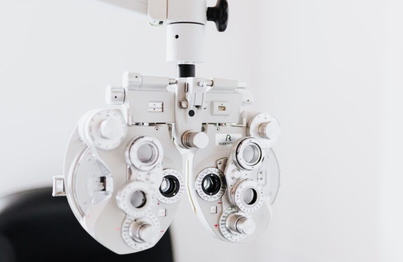A phoropter in a bright test room