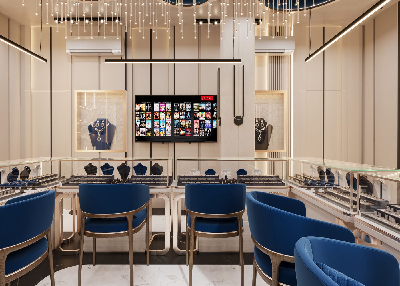A jewellery shop with glass display cases and navy chairs at the counter