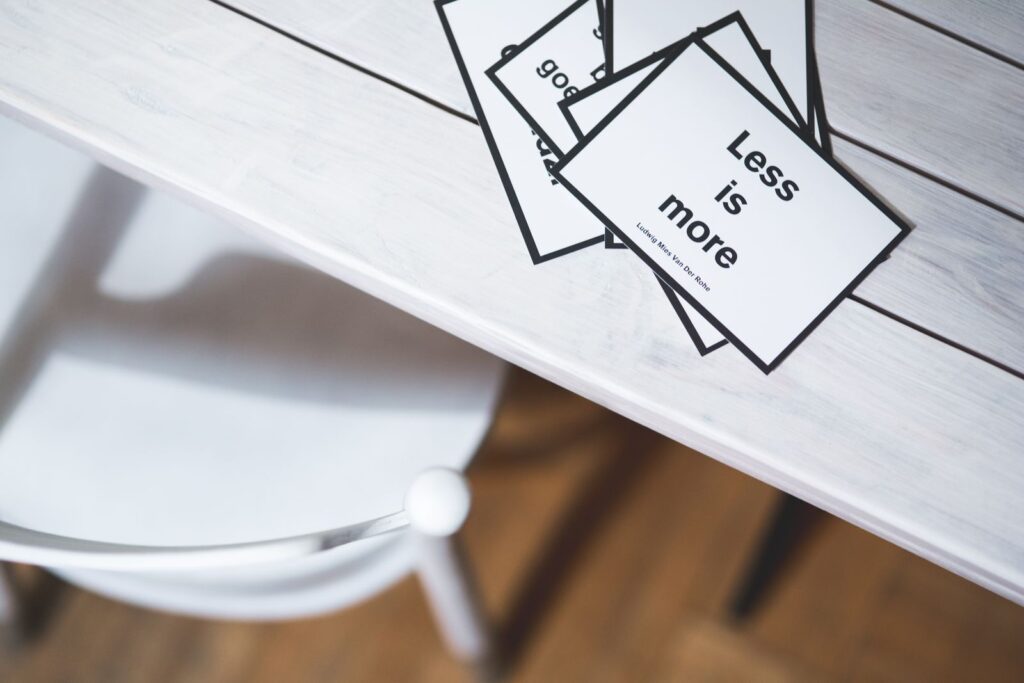 Printed cards with short phrases on a white table