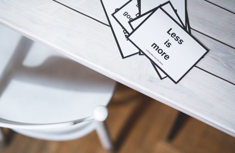 Printed cards with short phrases on a white table