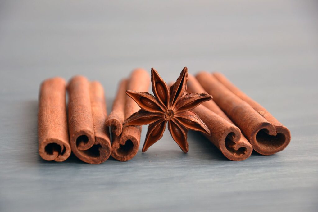Cinnamon sticks and star anise on a wooden table