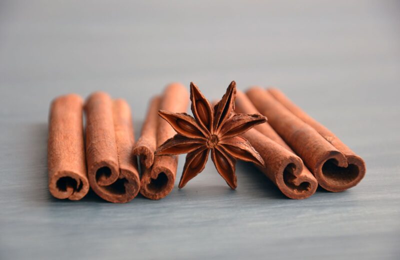Cinnamon sticks and star anise on a wooden table