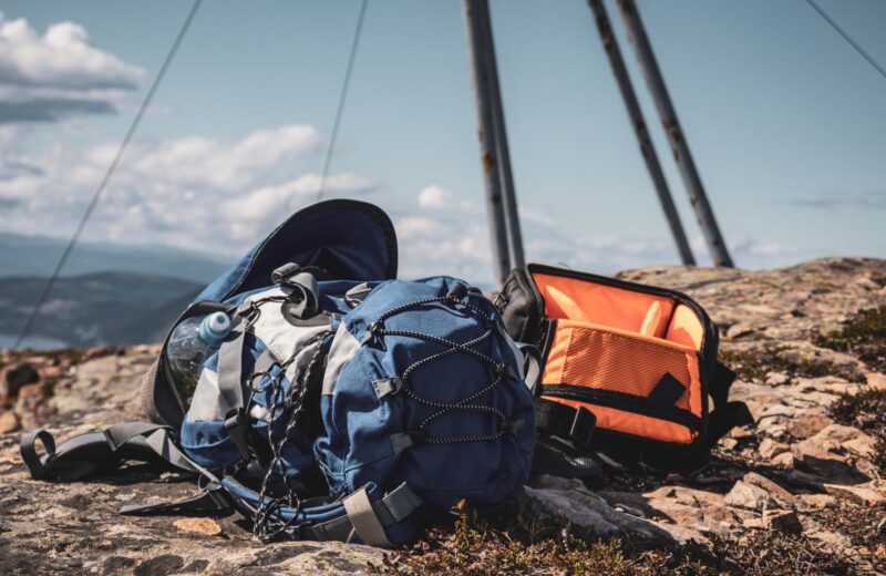 Two rucksacks resting on a rocky mountain top